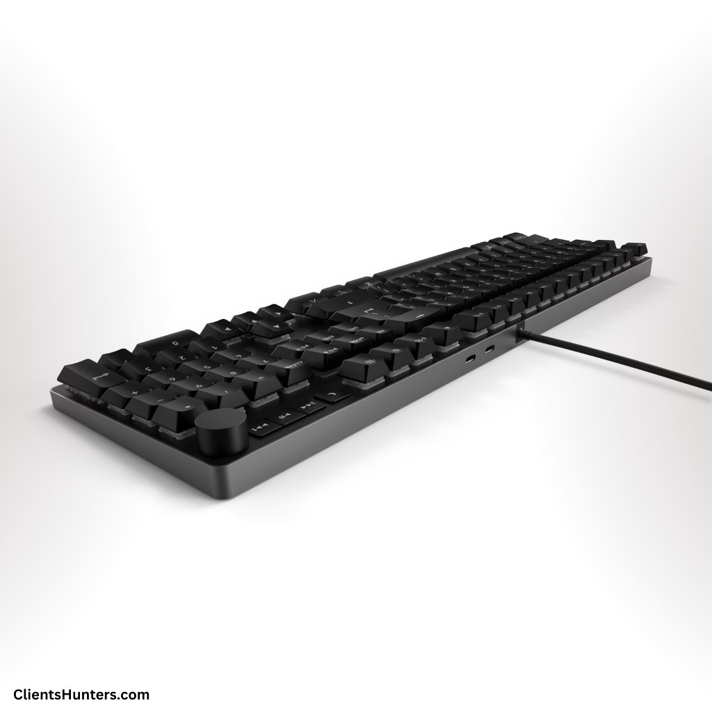 Side view of Das Keyboard MacTigr mechanical keyboard with USB-C ports and volume knob