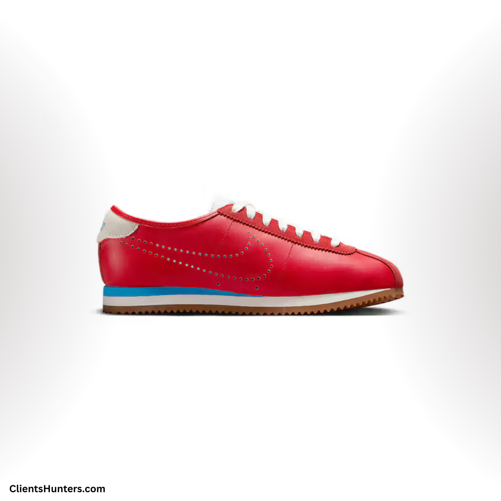 Side view of Nike Cortez "Perforated Leather" in University Red with perforated Swoosh and gum sole.